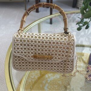 Elegant Cream Woven Handbag with Bamboo Handle